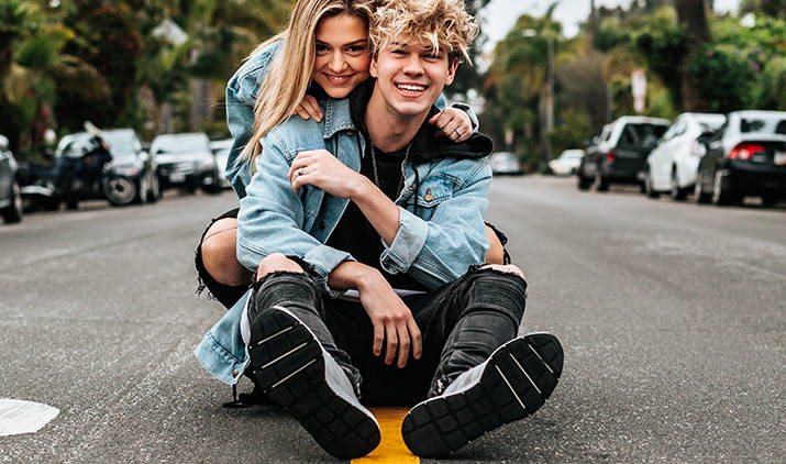 couple posing in the street