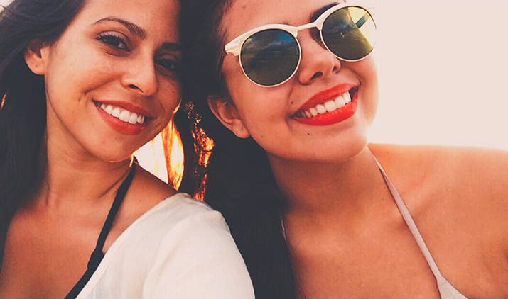 two ladies smiling