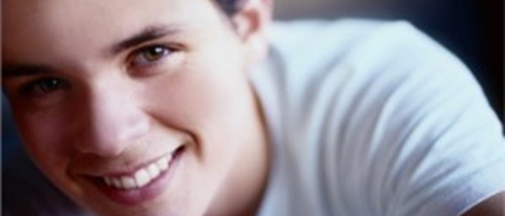 close up of young man smiling