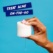 Hand holding Clearasil container with message: treat acne on-the-go