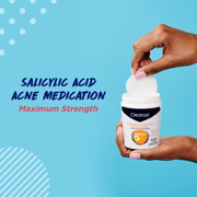 Hand opening Clearasil container labeled: salicylic acid acne medication, maximum strength